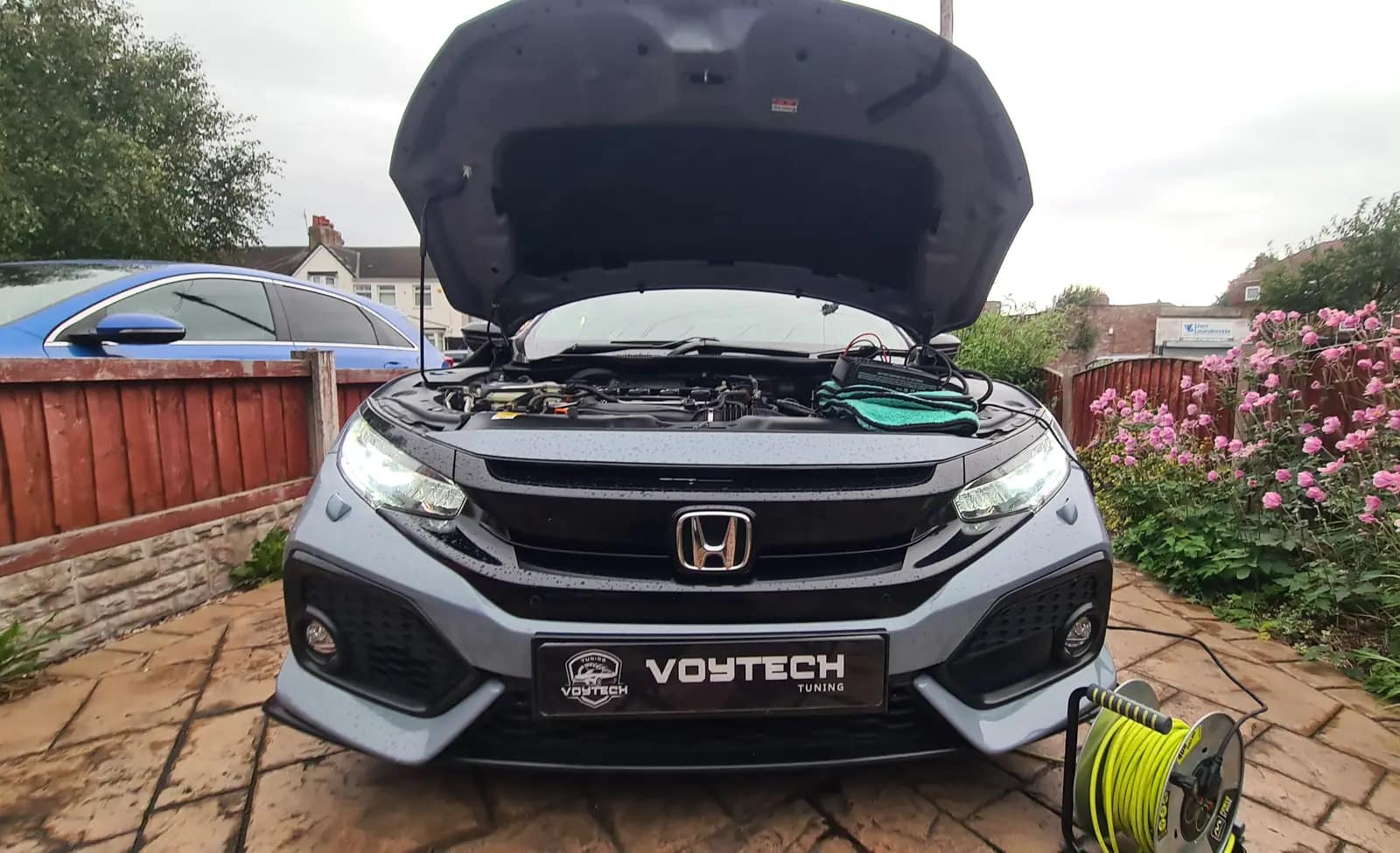 Honda Civic with a VOYTECH plate, bonnet up for a remap