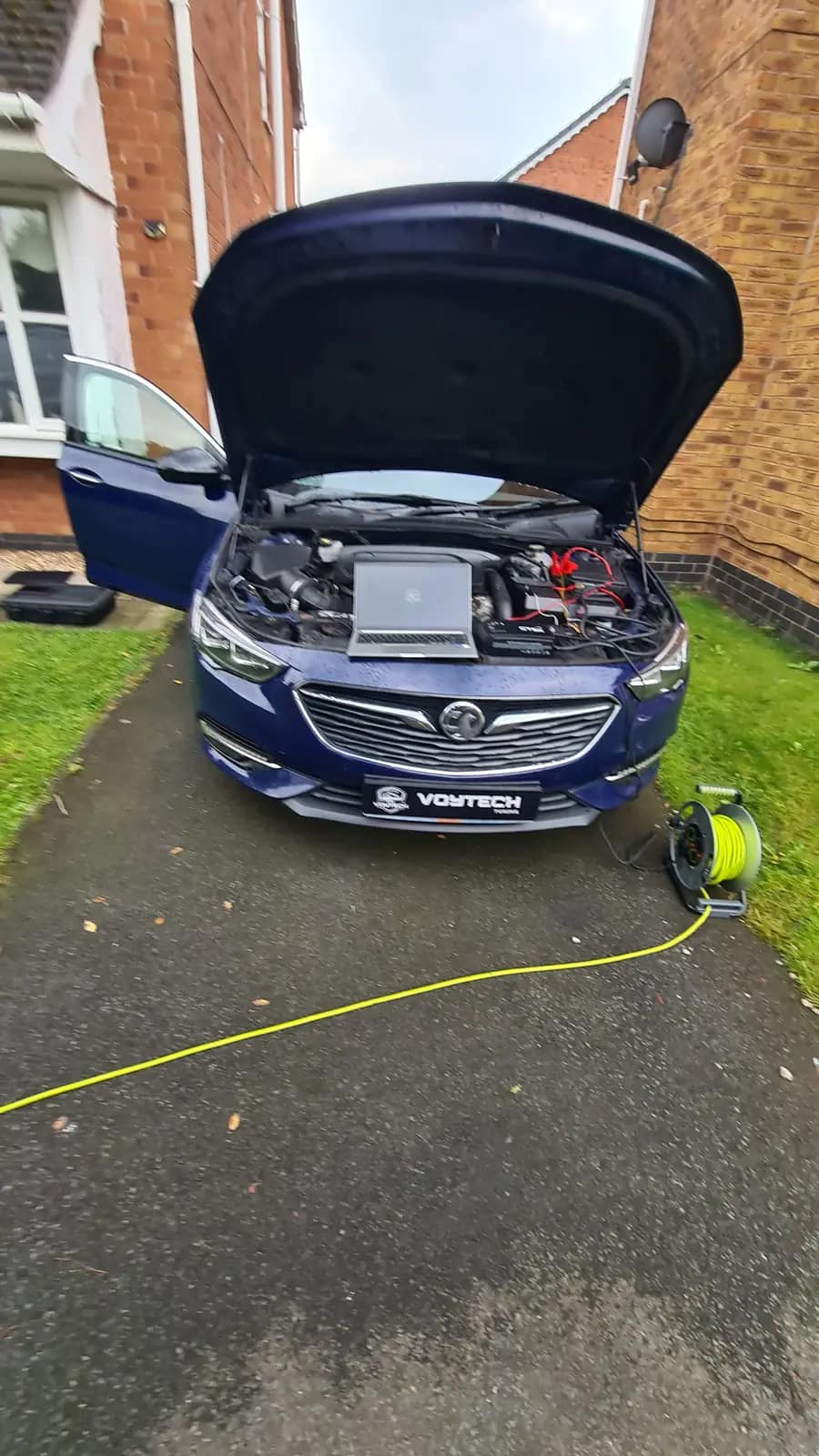 Vauxhall with a laptop on the engine during a mobile remap